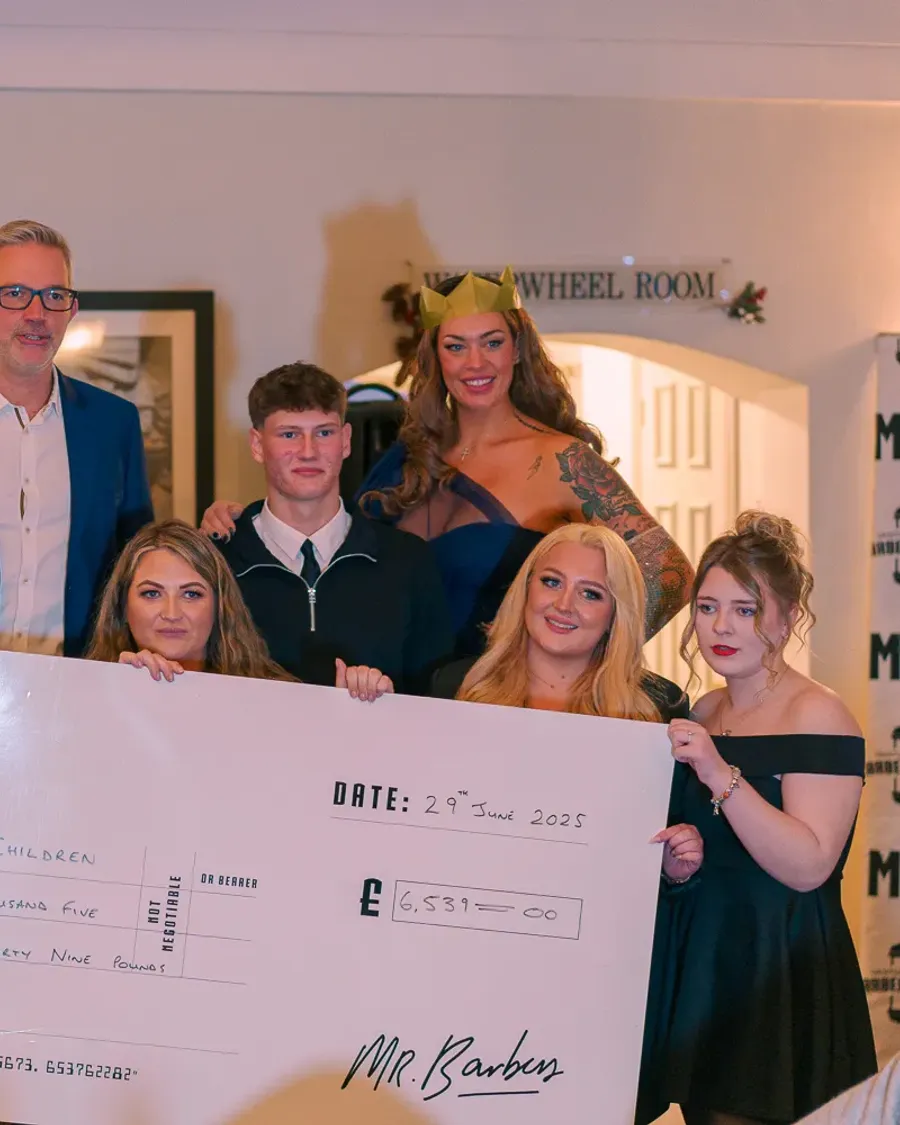 Award presentation captured by a Cambridge event photographer by Immortal Photography