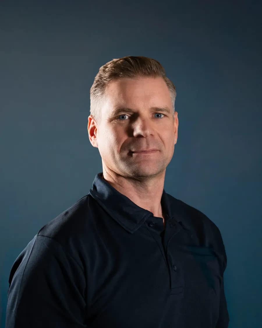 Studio headshot on a dark background in Cambridge by Immortal Photography