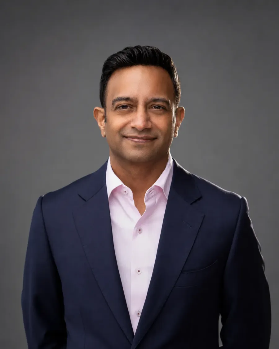 Clean studio personal-branding headshot of a professional by Immortal Photography
